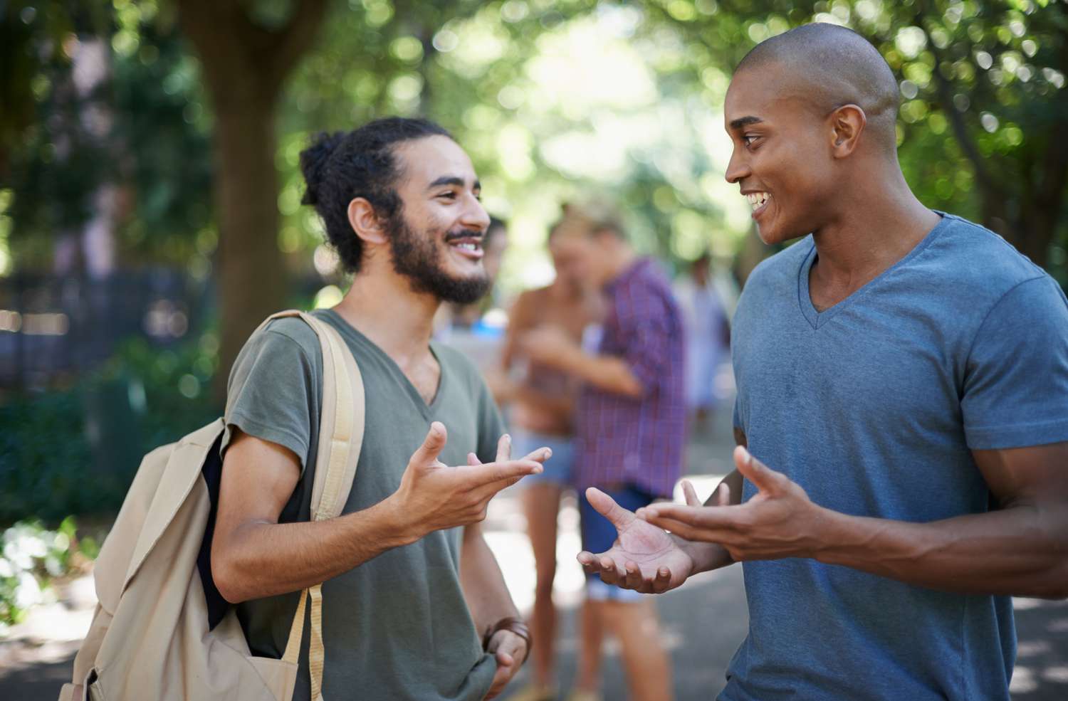 Two people having a friendly conversation outdoors